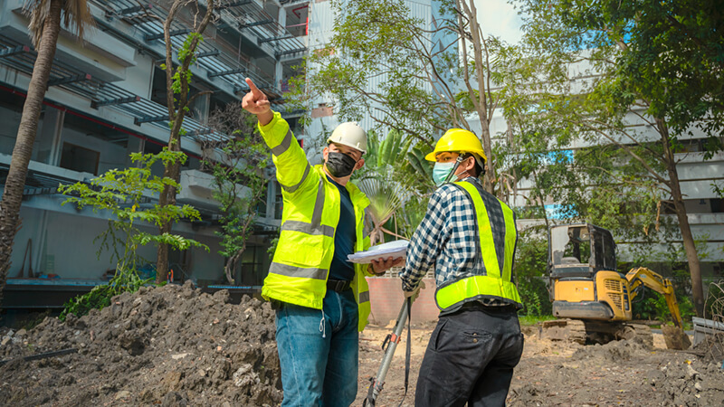 Contractors conducting a site survey.